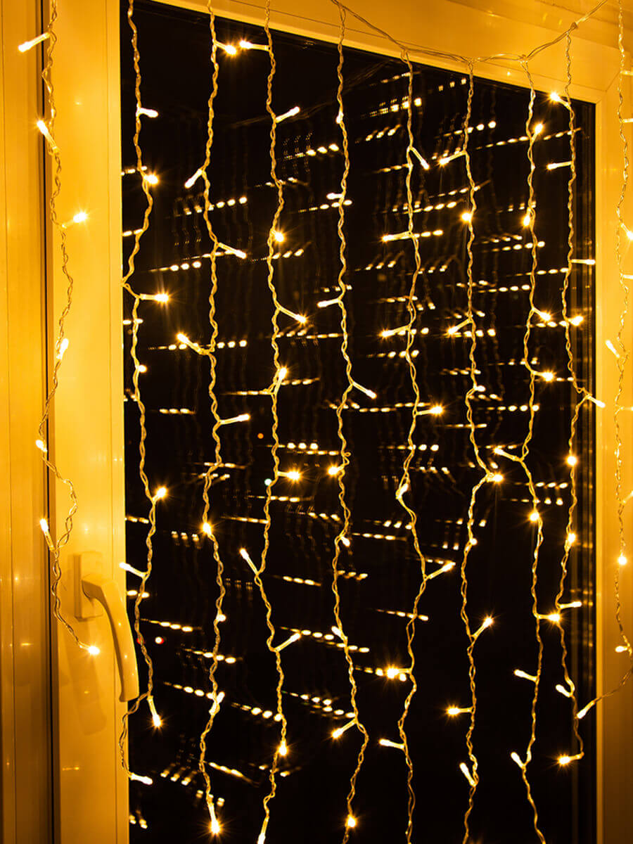 Светодиодная гирлянда (UL-00003678) Uniel бахрома 230V теплый белый ULD-B3010-200/DTA WarmWhite IP20