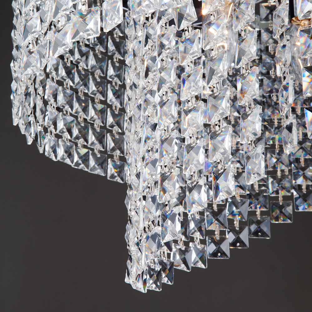 Подвесная люстра Eurosvet Leoni 10090/5 хром/прозрачный хрусталь Strotskis