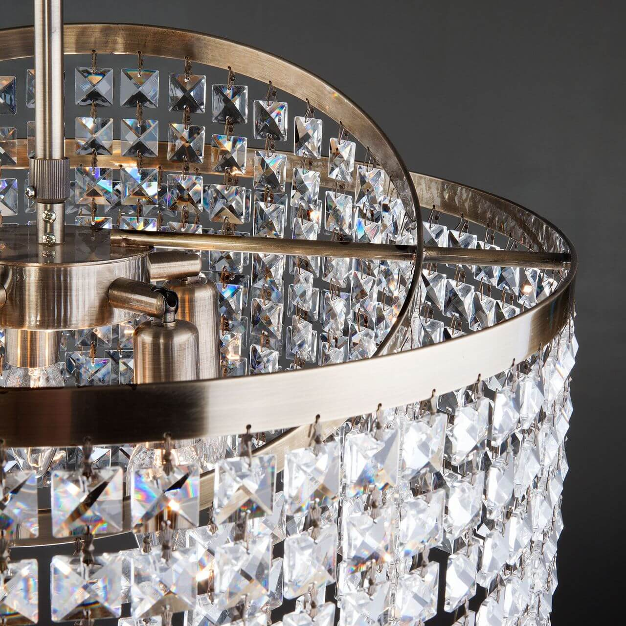 Подвесная люстра Eurosvet Leoni 10090/5 античная бронза/прозрачный хрусталь Strotskis